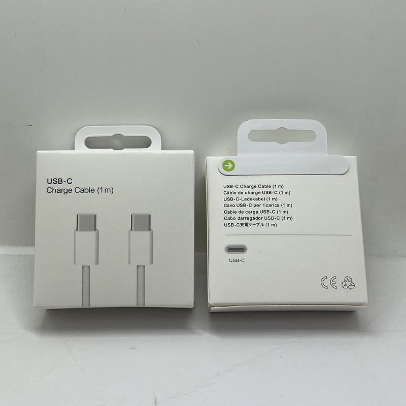 Two white USB-C charge cable boxes displayed side by side, showing packaging with connector illustrations and multilingual