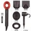 Flat lay of red and black microphone accessories including pop filter, shock mount, XLR cable, windscreen, and stand clip